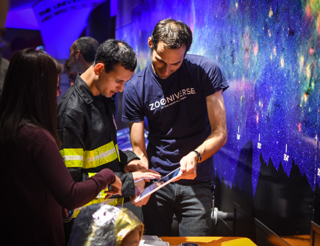 Adler staff Interacting with members during members night