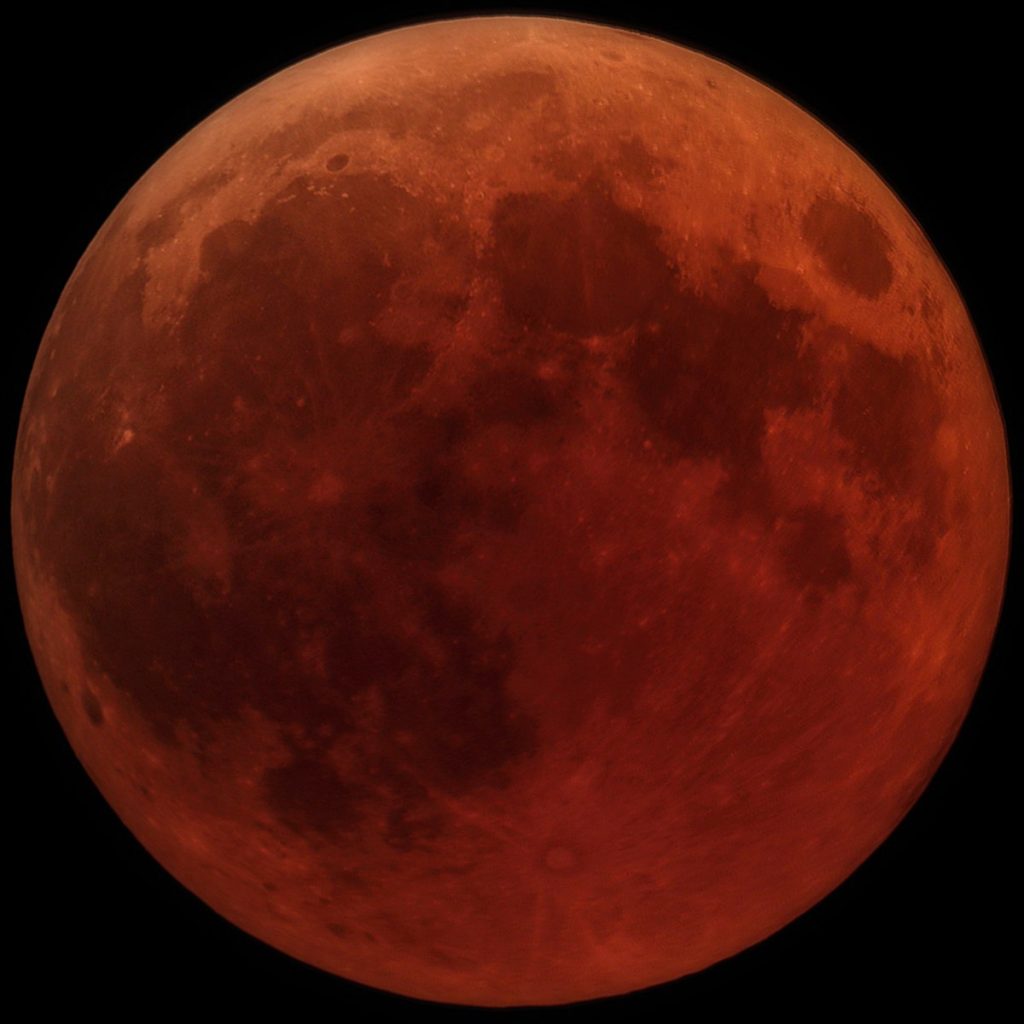 Image Caption: Total lunar eclipse as seen from Italy on July 27, 2018.