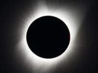A total solar eclipse is seen on August 21, 2017 above Madras, Oregon, USA. Image Credit: NASA/ Aubrey Gemignani