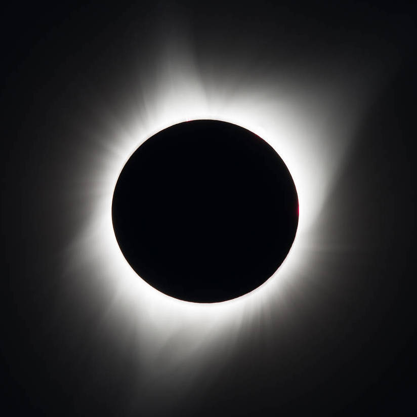 A total solar eclipse is seen on August 21, 2017 above Madras, Oregon, USA. Image Credit: NASA/ Aubrey Gemignani