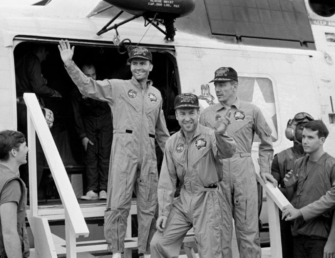 Apollo 13 crew returning home after their ocean landing.