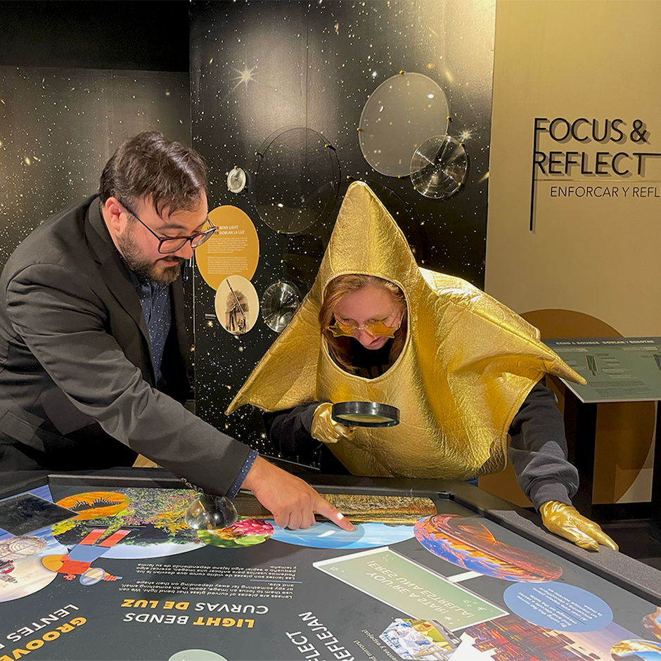 The Adler Planetarium Star exploring our newest exhibit, Stargazers Hub, with a museum educator.