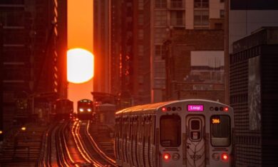The Sun sets during Chicagohenge as a CTA train in Chicago, Illinois travels towards it. Image Credit: @cdats