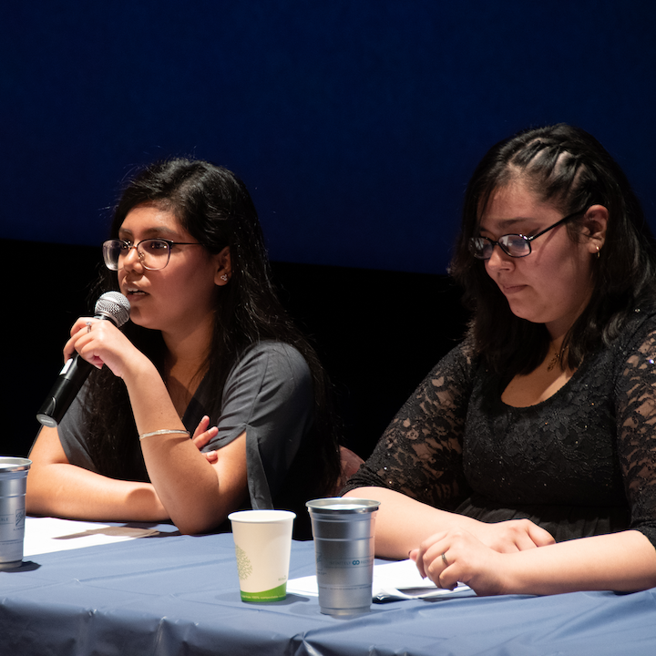 From left to right, Ashley and Guadalupe at the panel discussion during the Little Village Night Sky exhibit opening at the Adler Planetarium. Image credit: Aurelio Rodriguez.
