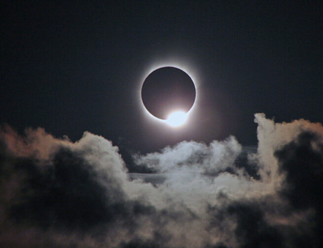 The "diamond ring" phenomena occurs just before totality occurs, during a total solar eclipse. Image credit: Rick Fienberg / TravelQuest International / Wilderness Travel