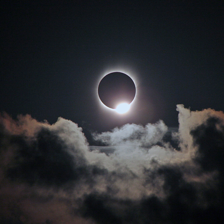 The "diamond ring" phenomena occurs just before totality occurs, during a total solar eclipse. Image credit: Rick Fienberg / TravelQuest International / Wilderness Travel