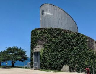 The Adler's Doane Observatory as seen on a clear day with blue skies above.