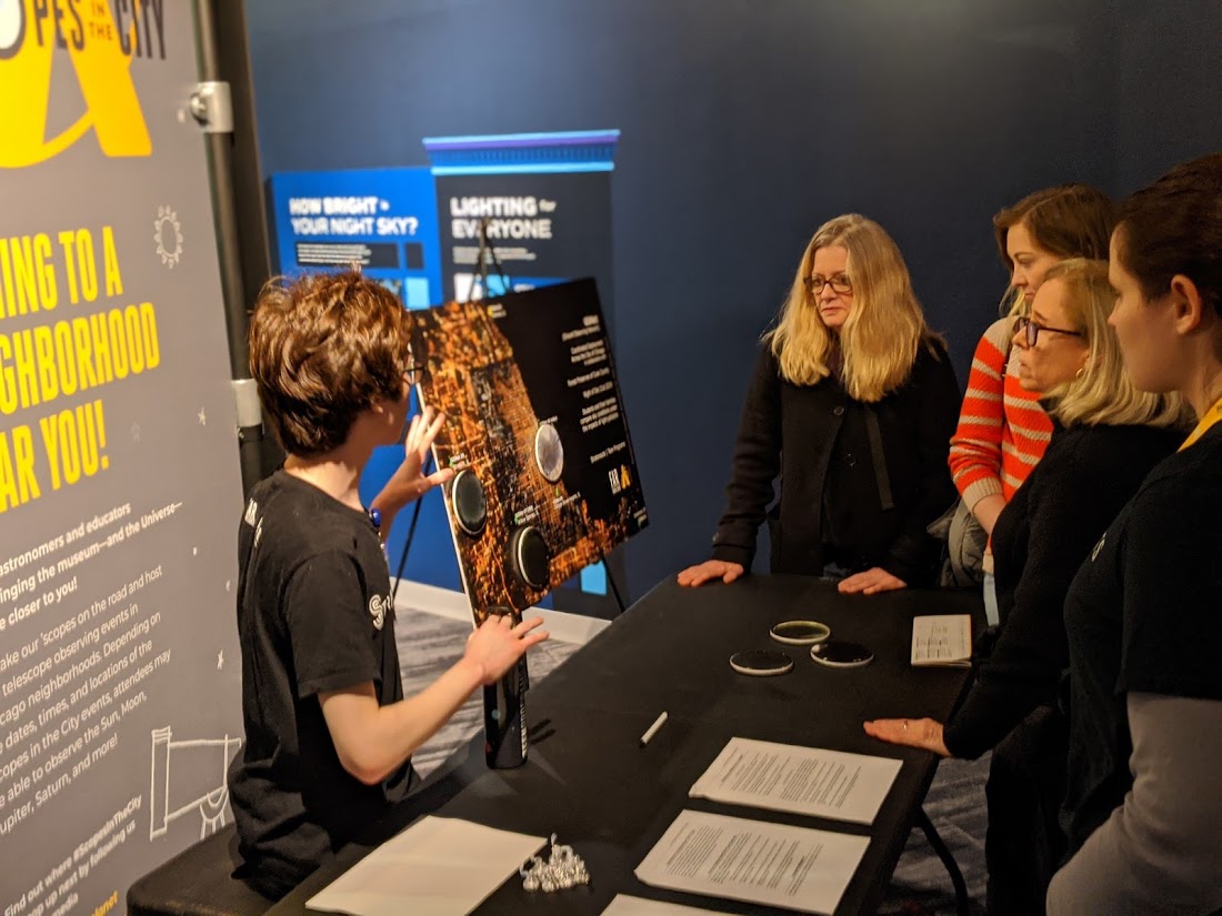 Adler Teen Stratonaut Duncan A. Yuen presenting the team's findings about light pollution from the trip to Little Red Schoolhouse at an Adler Planetarium event.