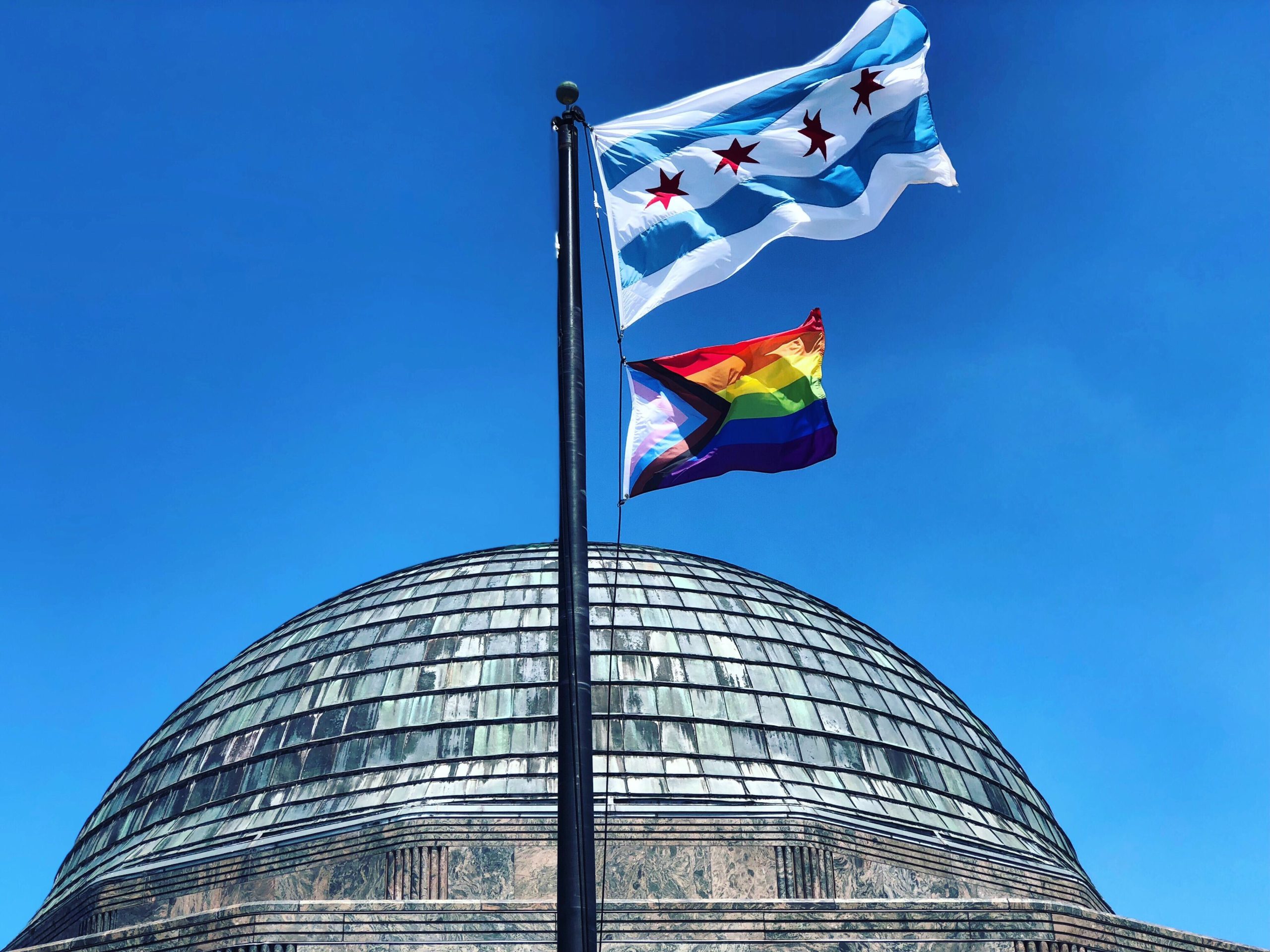 Adler Planetarium flying the Progress Pride Flag in 2019