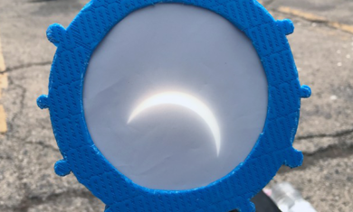 The August 21, 2017 total solar eclipse shown through a telescope at the Adler Planetarium in Chicago, IL while the Sun is still partially covered.