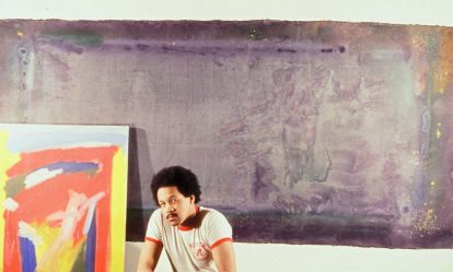 Image: Frederick J. Brown with two of his works, late 1970s (courtesy of the Frederick J. Brown Trust).