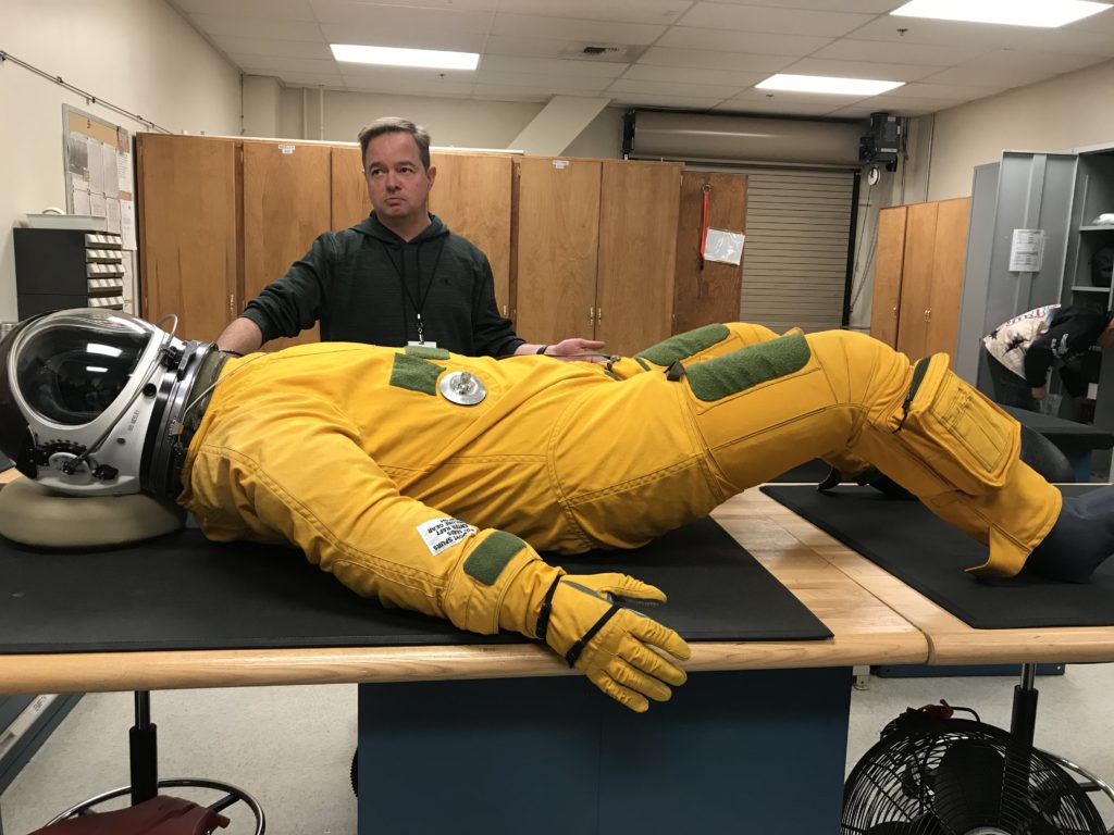 Image Caption: Here is the special spacesuit that will be used for some of the Earth Venture missions. In the top picture it is fully deflated and in the bottom picture it is fully inflated.