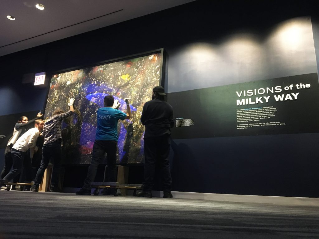 Image: Adler staff installing Brown’s “Milky Way” in the Adler Planetarium’s new exhibit, Chicago’s Night Sky.