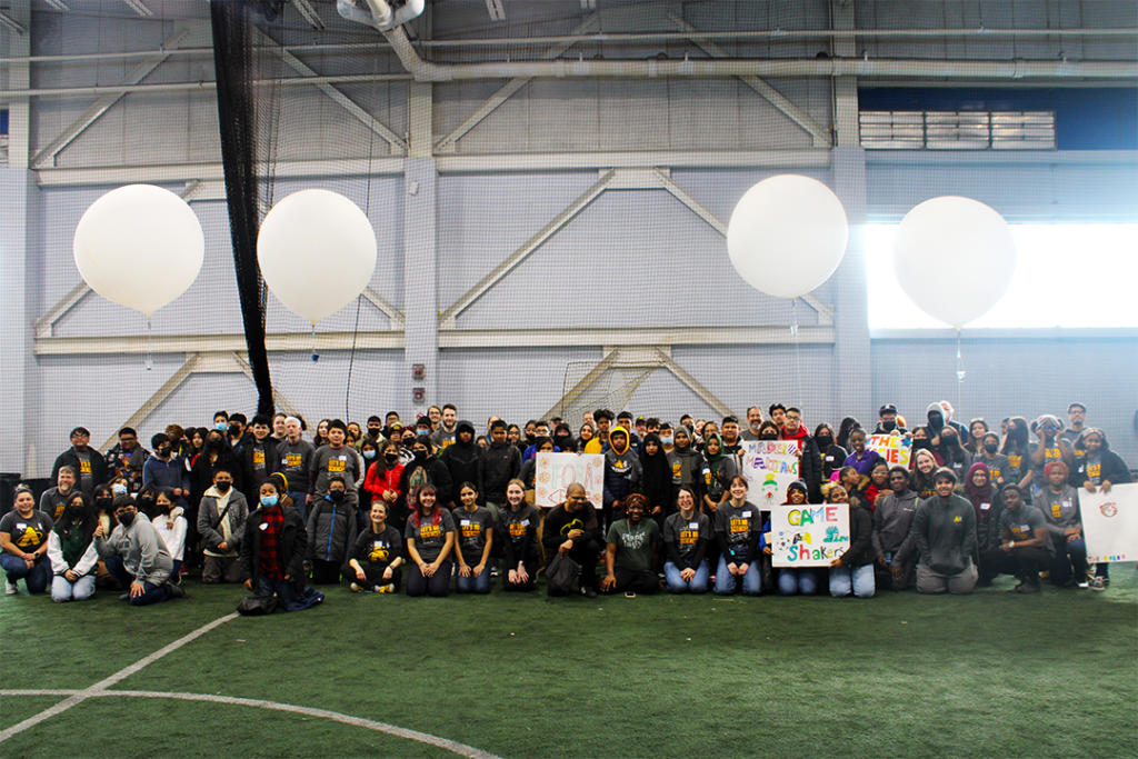 All students, mentors, and Adler volunteers who participated in Operation Airlift 2023 in front of four high-altitude balloons.