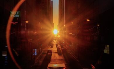 The Sun setting perfectly in between skyscrapers down an east-west facing street in Chicago, Illinois. Due to the grid orientation in the City of Chicago, during an equinox the Sun sets perfectly down the middle of the city’s streets—a phenomenon known as Chicagohenge. Image credit: Raf Winterpacht (@rafwinterpacht on Instagram)