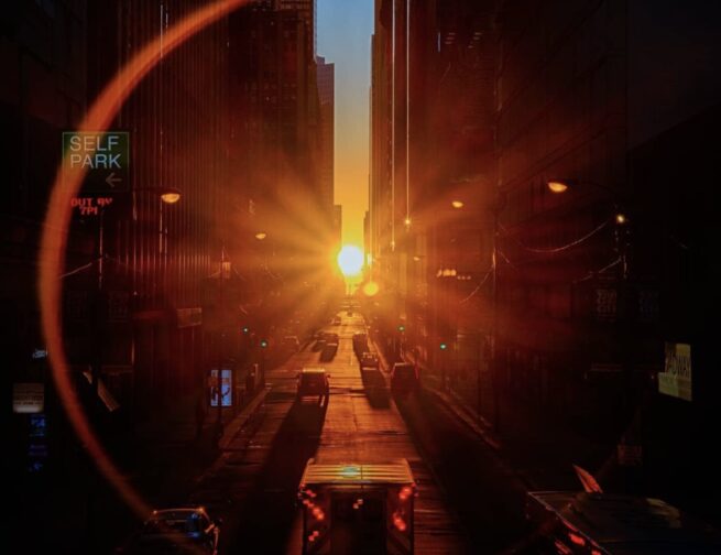 The Sun setting perfectly in between skyscrapers down an east-west facing street in Chicago, Illinois. Due to the grid orientation in the City of Chicago, during an equinox the Sun sets perfectly down the middle of the city’s streets—a phenomenon known as Chicagohenge. Image credit: Raf Winterpacht (@rafwinterpacht on Instagram)