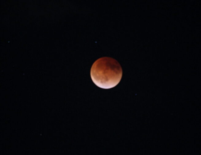 The March 15, 2022 lunar eclipse at totality. The full Moon appears to be brick red in color as the Earth’s shadow covers it.