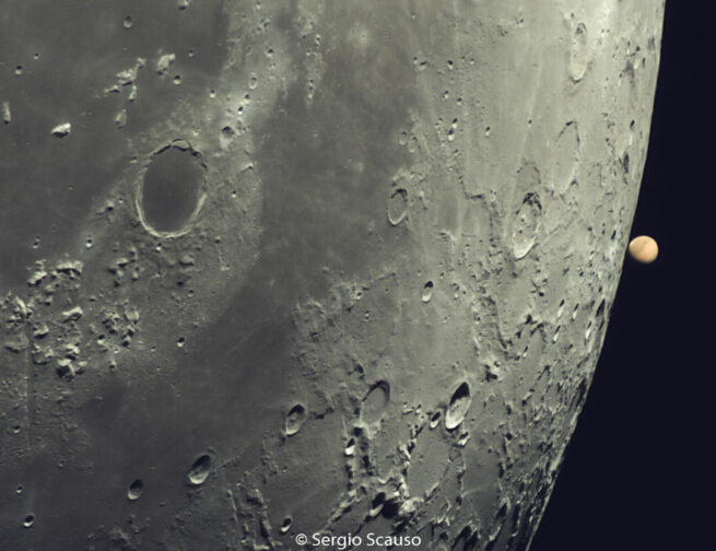 Close up image of the Moon as Mars reappears on the right side of the moon after an occultation. Image credit: Sergio Scauso