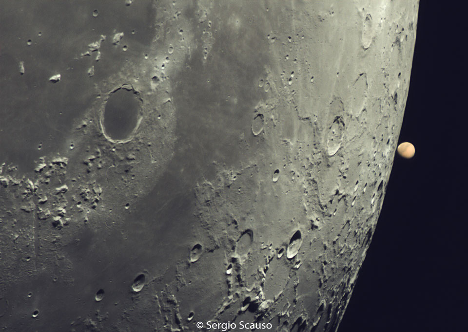 Close up image of the Moon as Mars reappears on the right side of the moon after an occultation. Image credit: Sergio Scauso