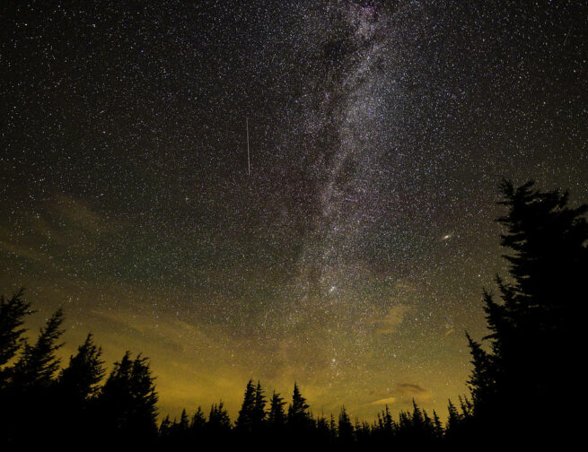 In this 30 second exposure, a meteor streaks across the sky during the annual Perseid meteor shower Friday, Aug. 12, 2016 in Spruce Knob, West Virginia. Image credit: NASA/ Bill Ingalls