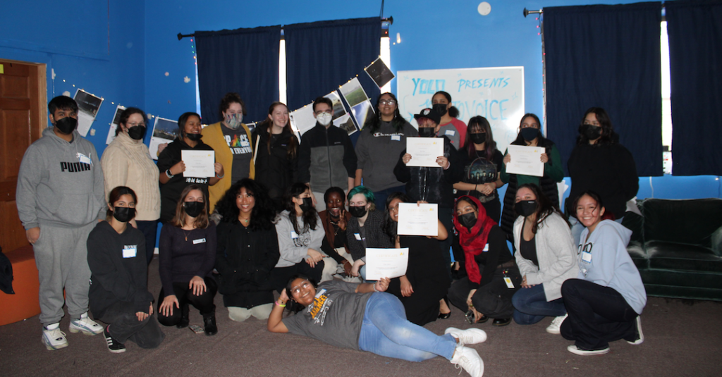 Youth Organization for Lights Out, Far Horizons Teen Captains, and Youth Leadership Council participants at the Pop-Up Photovoice Exhibit Event at Enlace Chicago’s Troy Office in Little Village in December, 2022.