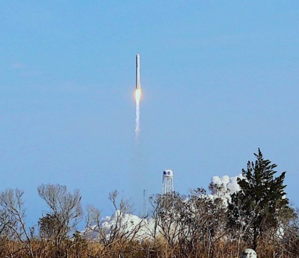 Rocket with the Adler Planetarium's first ThinSat launching into space.