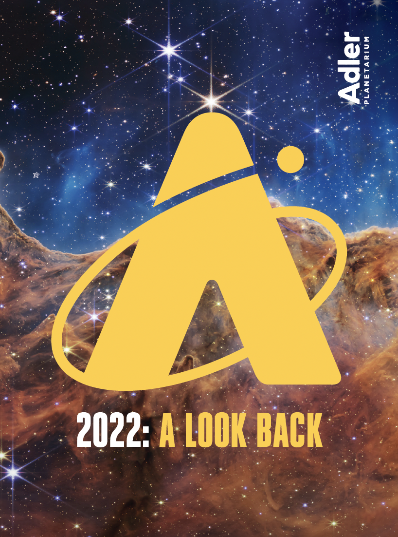 Cover of 2022 A Look Back report. Adler monogram A in yellow with carina nebula image from JWST as the background. Blue, light brown and many twinkling stars.