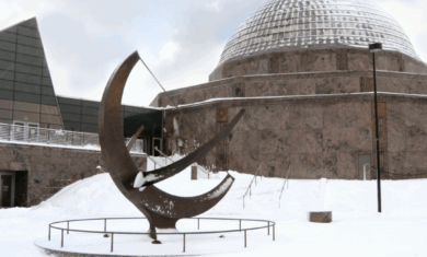 Snow covered outside shot of the Adler Planetarium