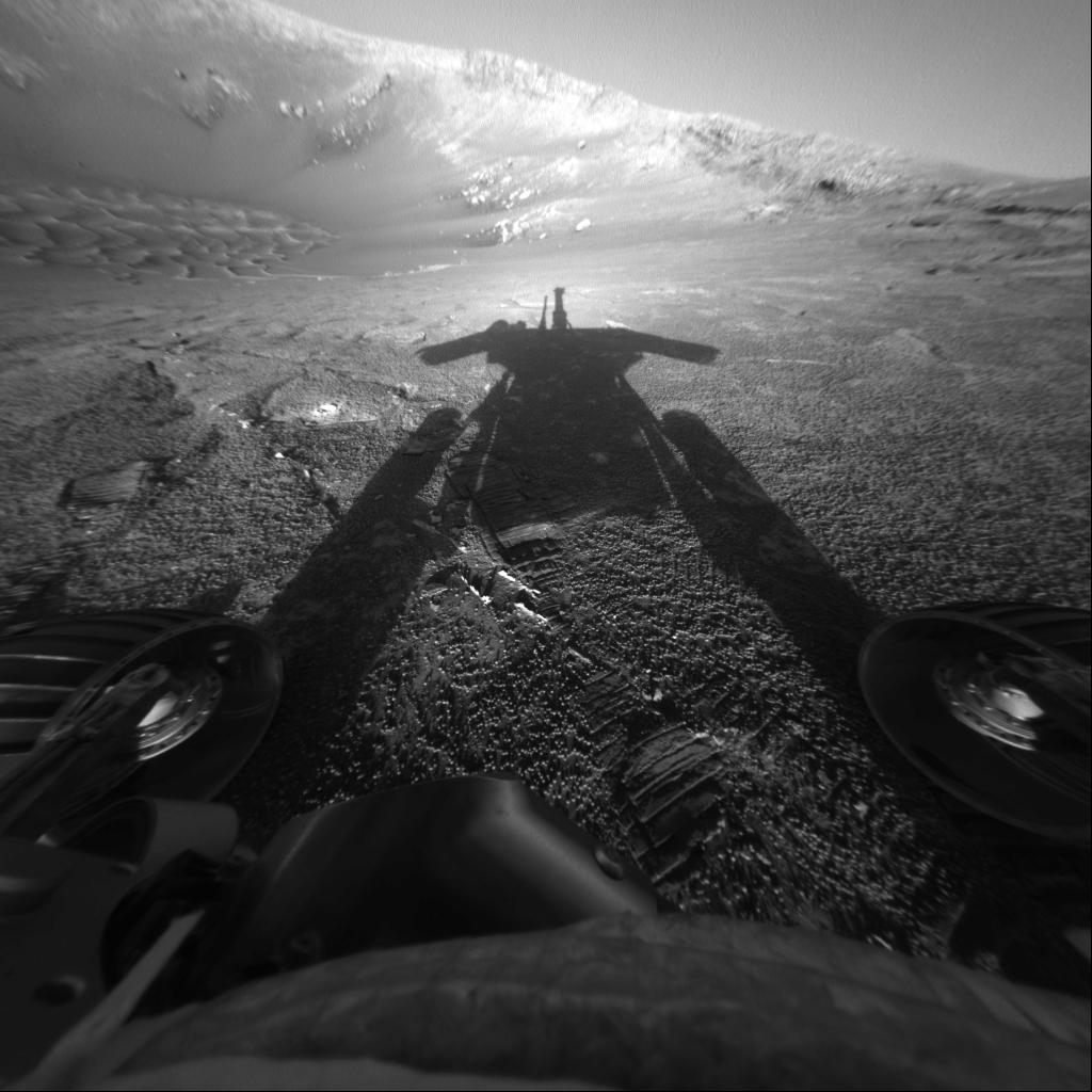 This self-portrait of NASA's Mars Exploration Rover Opportunity comes courtesy of the Sun and the rover's front hazard-avoidance camera. Photo credit: NASA