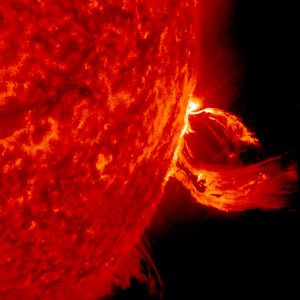 A close up of a substantial coronal mass ejection, one type of solar storm, from June 2015. This image taken in an extreme ultraviolet wavelength shows a magnetic loop erupting on the solar surface.  Credits: Solar Dynamics Observatory/NASA 