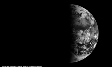 Black and white image of the Earth, as seen from space, on the spring equinox in 2013. Image Credit: Nasa/ Earth Observer, edited by the Adler Planetarium