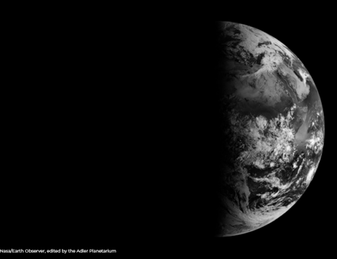 Black and white image of the Earth, as seen from space, on the spring equinox in 2013. Image Credit: Nasa/ Earth Observer, edited by the Adler Planetarium