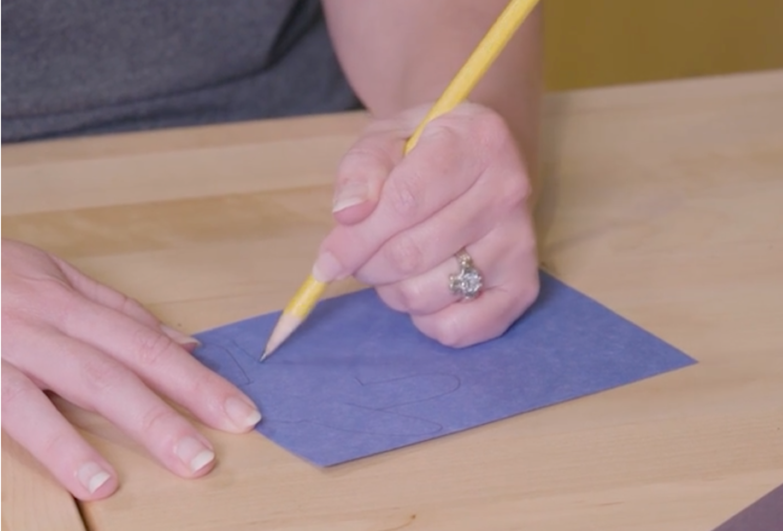 Photo demonstrating how to draw a pattern on your piece of thick paper.