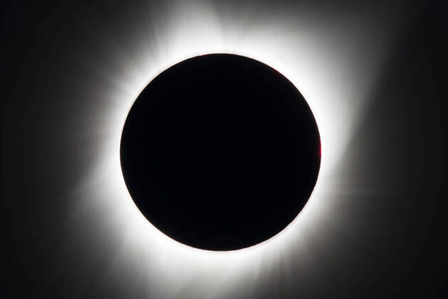 A total solar eclipse is seen on August 21, 2017 above Madras, Oregon, USA. Image Credit: NASA/ Aubrey Gemignani