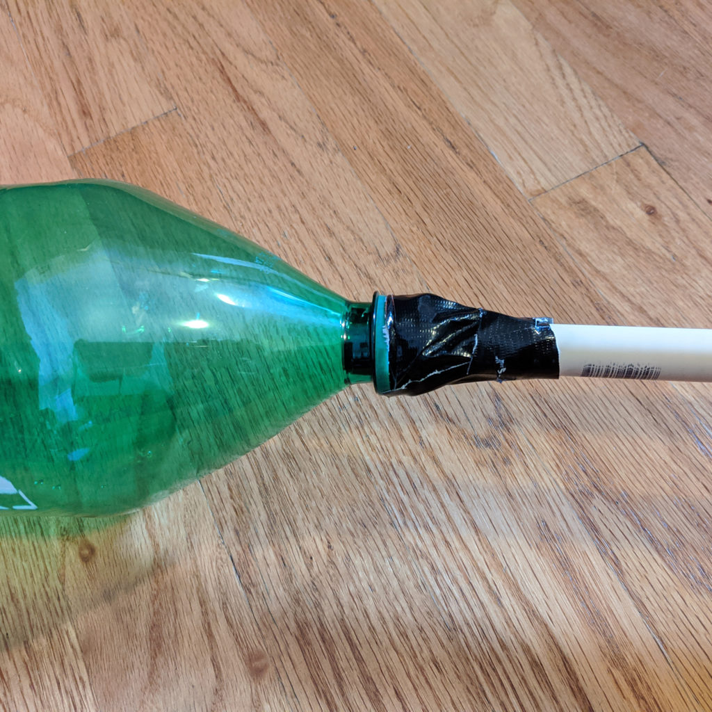 When creating your stomp rocket launcher, make sure you securely connect the bottle and PVC pipe with tape