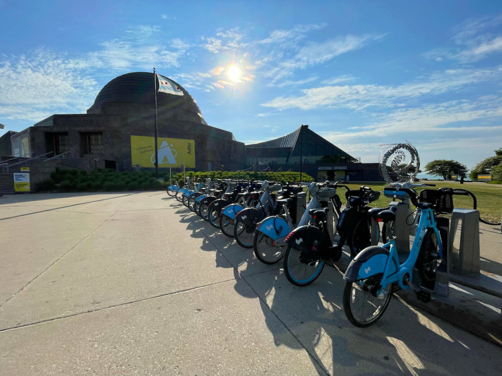 Divvy Bike station located in front of the Adler Planetarium in Chicago, IL.