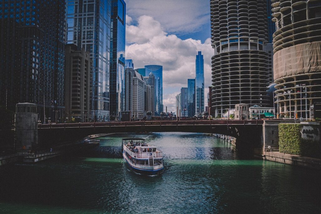 Water taxi passing underneath a bridge on the Chicago River. Image credit: Jake Leonard 
