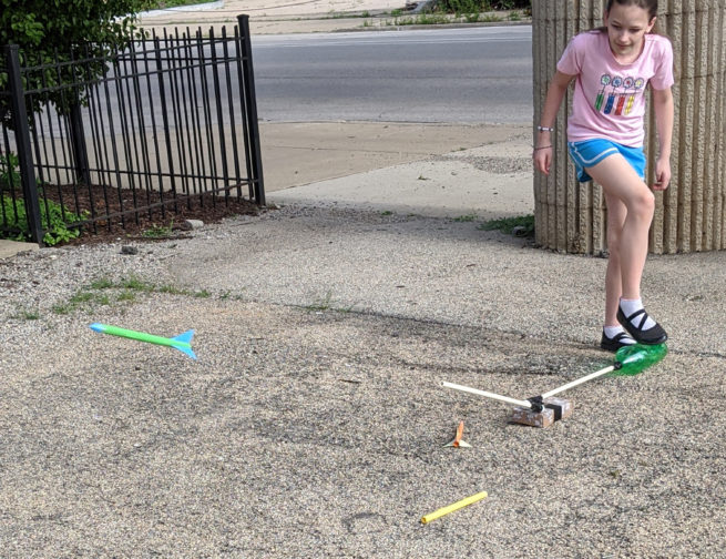 Create your own stomp rocket with supplies from around your house and launch it outside!