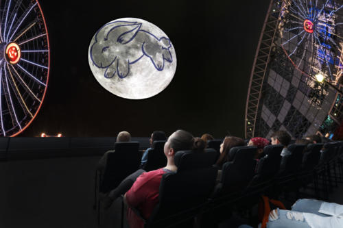 Guests watching the Adler's newest sky show, "Imagine the Moon."