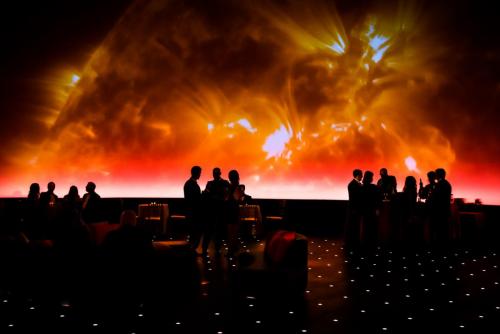 An image of Adler guests in the  Grainger Sky Theater during a private event.