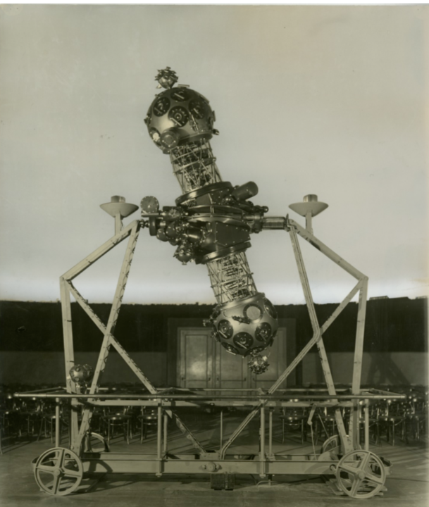 Image Caption: The Zeiss Mark II projector can be seen here in the Adler's original domed theater in the 1930s. Image Credit: The Adler Planetarium Archives